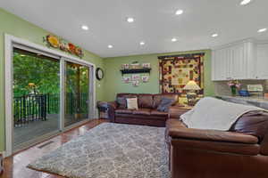 Living room with light wood-type flooring