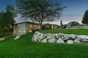 View of yard at dusk