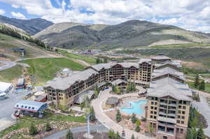 Drone / aerial view featuring a mountain view