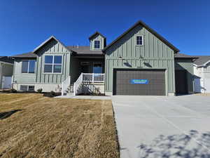 View of front of house featuring a front lawn