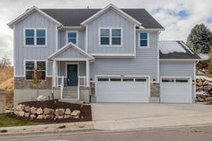 View of front of home with a garage