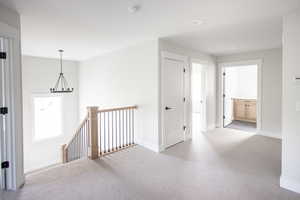 Custom Built Railing and open hallway.