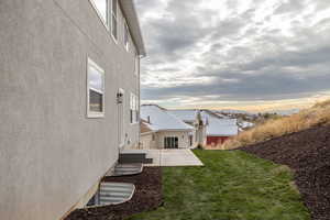 View of yard with a patio