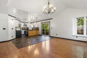 Updated kitchen, dining area, and living room. New flooring, appliances, and granite countertops.