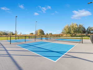 View of sport court featuring basketball court