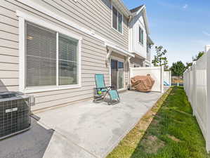 View of patio / terrace featuring cooling unit