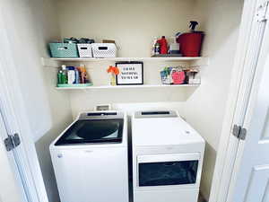 Laundry room featuring washer and dryer