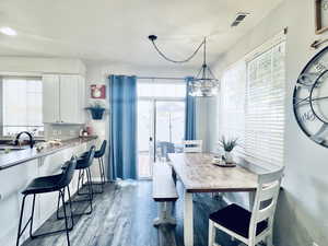 TAKE IN THE SHADE AND GREEN SPACE VIEWS FROM THE DINING AREA