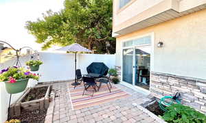 PATIO ENJOYS EVENING SHADE DUE TO LARGE TREE TO WEST