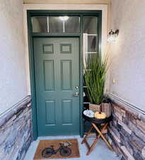 FRESHLY PAINTED FRONT DOOR GREETS GUESTS