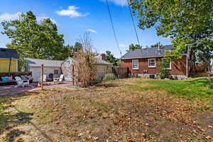 View of yard featuring cooling unit, an outdoor living space, and a patio area