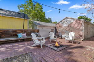 View of patio / terrace with a fire pit