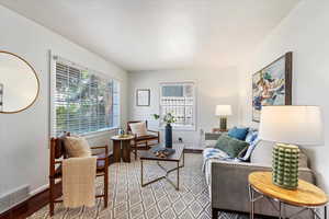 Living room with light wood-type flooring