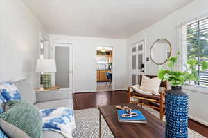 Living room featuring dark hardwood / wood-style floors