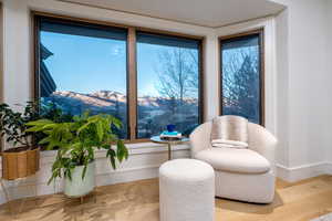 Sitting room featuring hardwood / wood-style flooring