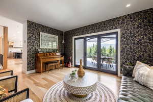 Living room featuring light hardwood / wood-style flooring and french doors