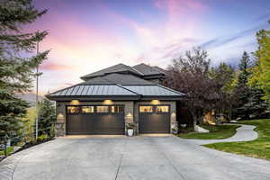 View of front of home with a garage