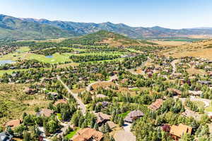 Bird's eye view featuring a water and mountain view