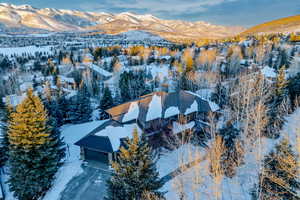 Snowy aerial view with a mountain view
