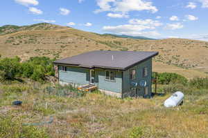 Exterior space featuring a mountain view