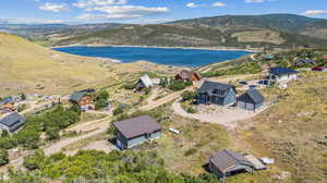 Bird's eye view featuring a water and mountain view