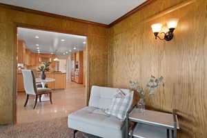 Wood paneling and wall sconces to add to the traditional design