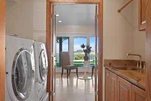 Main level laundry room off of kitchen