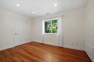 Primary Suite with Cherry Hardwood floors