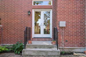 Side door with steps and railing