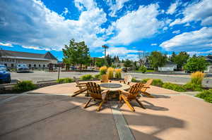 View of patio / terrace with an outdoor fire pit