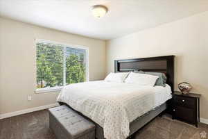 View of carpeted bedroom