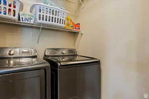 Laundry room featuring washer and dryer