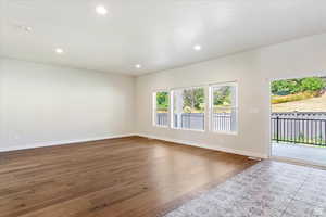 Empty room featuring light hardwood / wood-style floors