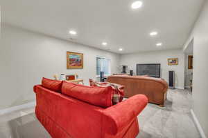 Living room with light colored carpet