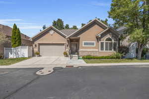 View of front of property with a garage