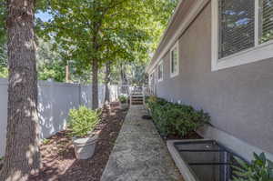 View of yard with a wooden deck