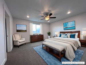 Carpeted bedroom with ceiling fan