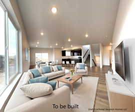 Living room with plenty of natural light and wood-type flooring