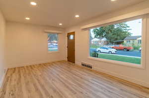 New front window, 22 mil lvp flooring, baseboards