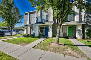 View of property featuring a front yard