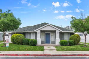 View of front facade with a front lawn