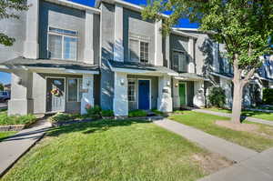 View of front of property featuring a front yard