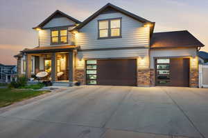 View of front of home with a garage