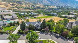 Birds eye view of property with a mountain view