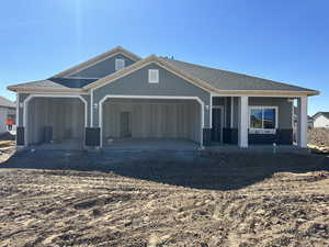 View of front facade with a garage