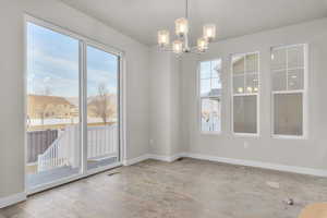 Interior space featuring a chandelier and light hardwood / wood-style flooring