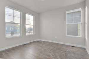 Spare room with light hardwood / wood-style floors