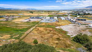 Birds eye view of property featuring a mountain view and a rural view