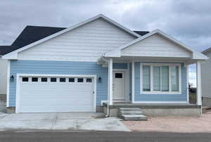 View of front of home with a garage