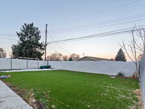 View of yard at dusk